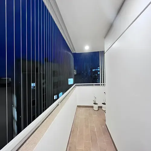 Invisible grill installed on a modern balcony
